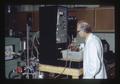 Arthur Anderson with equipment for making yeast from straw, Oregon State University, Corvallis, Oregon, December 1972