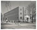 Students walking past the new Chemical Engineering building (Gleeson Hall)