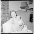 Home Economics student with a "practice baby," December 15, 1956