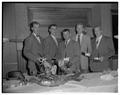 Seniors on the 1951 team pose at an OSC basketball banquet held at the Corvallis country club