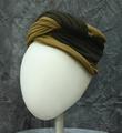 Turban style hat of light brown and dark brown wool knit