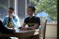 Students having discussion on table in Global Scholars Hall