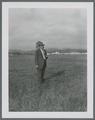 Harry Schoth standing on the original plot of alta tall fescue