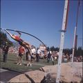 An OSU pole vaulter makes his attempt