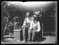 Finley and Bohlman sitting in a garden