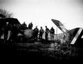 Soldiers and wrecked plane