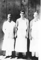 Three mess hall workers