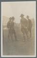 Officers talking on parade field, circa 1918