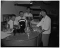 Ritchie Cowan, Farm Crops professor, with Turkish visitors, July 8, 1953