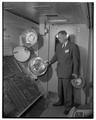 President Strand views an exhibit inside GE's More Power Special Train, April 10, 1951