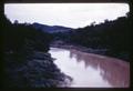 Muddy stream from erosion, Thailand, circa 1965