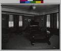 Interior of room in Benson Hotel, Portland. Table, couch in foreground, piano in far corner. (recto)