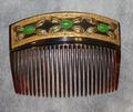 Hair Comb of tortoiseshell embellished at the top with ornate gold rectangle