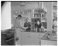 Students working in the kitchen of the new men's residence co-op, September 1954