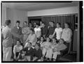 Dick Dagget leads the Phi Kappa Psi choral group, December 1950