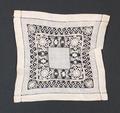 Tea Cloth or Doily of white linen with a wide inset of drawn-work floral lace