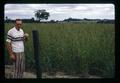 Don Hector and orchard grass field, near Granger, Oregon, June 1972
