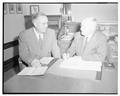 F.E. Price, new dean and director of agriculture, with retiring dean W.A. Schoenfeld.