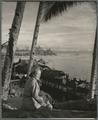 Nancy Dewey on the beach in the East Indies