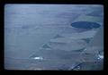 Aerial view of irrigated farmland and munition dump, Oregon, 1984