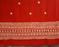 Textile yardage for a skirt of red woven cotton