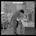 Visitors looking at lab equipment in Weniger Hall, Fall 1962