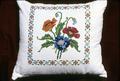 16 x 14 inch pillow with poppy seed flower on it, made around 1974