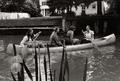 Four women in a canoe on the Millrace