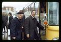 Paul Weswig and Harry Mack getting on bus to speak with Ways and Means Committee regarding faculty salaries, Oregon State University, Corvallis, Oregon, circa 1970