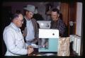 Superintendent Charles Rohde and others with Mettler balance, Pendleton Experiment Station, Pendleton, Oregon, circa 1965