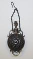 Chatelaine perfume flask of engraved metal