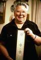 Nargir Brokaw holding sampler which she made in Hardanger in about 1978