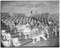 Bill Langan talking to high school students, trying to make the next year "bigger and better than ever before it!", February 1953