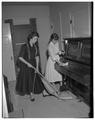 Home Economics students cleaning in the Kent House, May 1958