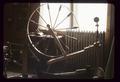 Spinning wheel with finials