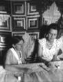 Two women quilting