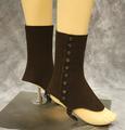 Spats of brown wool felt with button closures at side and belt buckle and wool strap for under foot securing