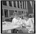 Jean Saubert, OSU student and Olympic skiing medalist, with a friend at the Memorial Union, July 1964