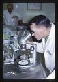 Dr. Stuart E. Knapp at microscope, circa 1966