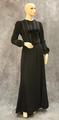 Skirt suit of black raised dot textured wool