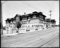 Glencoe School, Portland. Belmont St. and streetcar tracks in foreground.