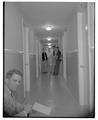 Students posing in the hallway of the new men's residence co-op, September 1954