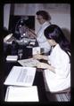 Researchers making microscope slides of cancerous tumor, Oregon State University, Corvallis, Oregon, circa 1971