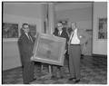 Gordon Gilkey, August Strand and an unidentified individual posing with a painting.