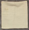 Pillowcase of hand-spun, hand-woven linen in a square shape with embroidered initials in corner in a beige silk cross-stitch, and an arrow