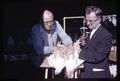 Dr. Robert W. Henderson and Dr. Paul Bernier comparing chickens, Oregon State University, Corvallis, Oregon, circa 1965