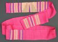 Belt or Sash of plain weave hot pink natural fiber with striped bands, and one broader bands with a geometric design