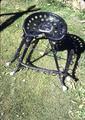 Patio chair made of hames, bits, horseshoes and seat, second example