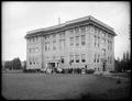 Exterior of Wood Marshall Hall, Pacific College, Newberg, OR. A large group of people are standing in front.