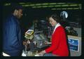 Mrs. Byer helping customer at register, Oregon, 1971